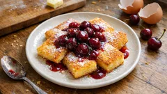 Grießschnitten mit Kirschkompott – außen knusprig, innen cremig